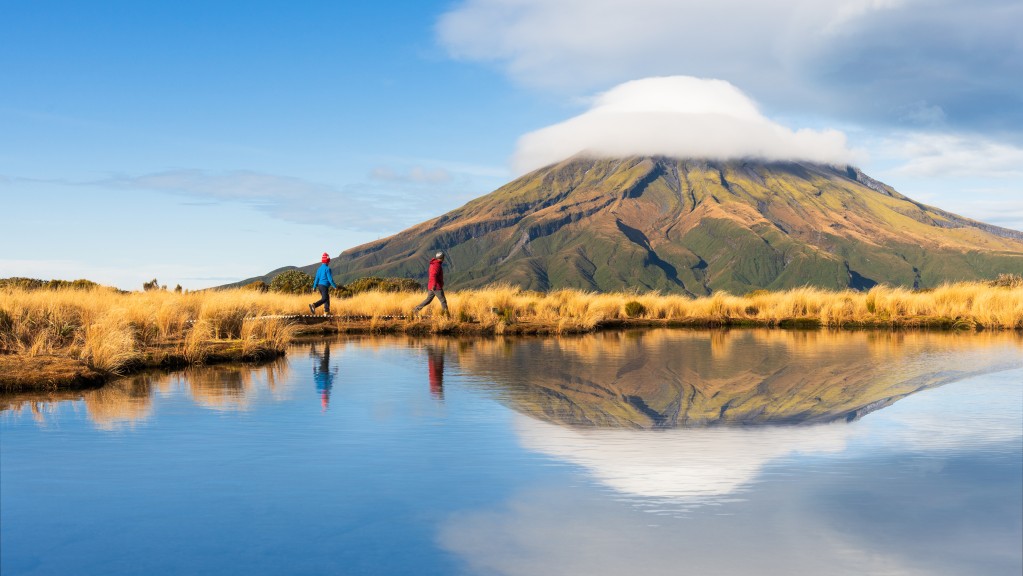 People walking by the mountain