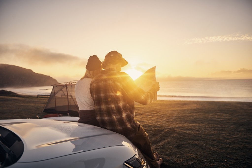 Looking at map in the sunset