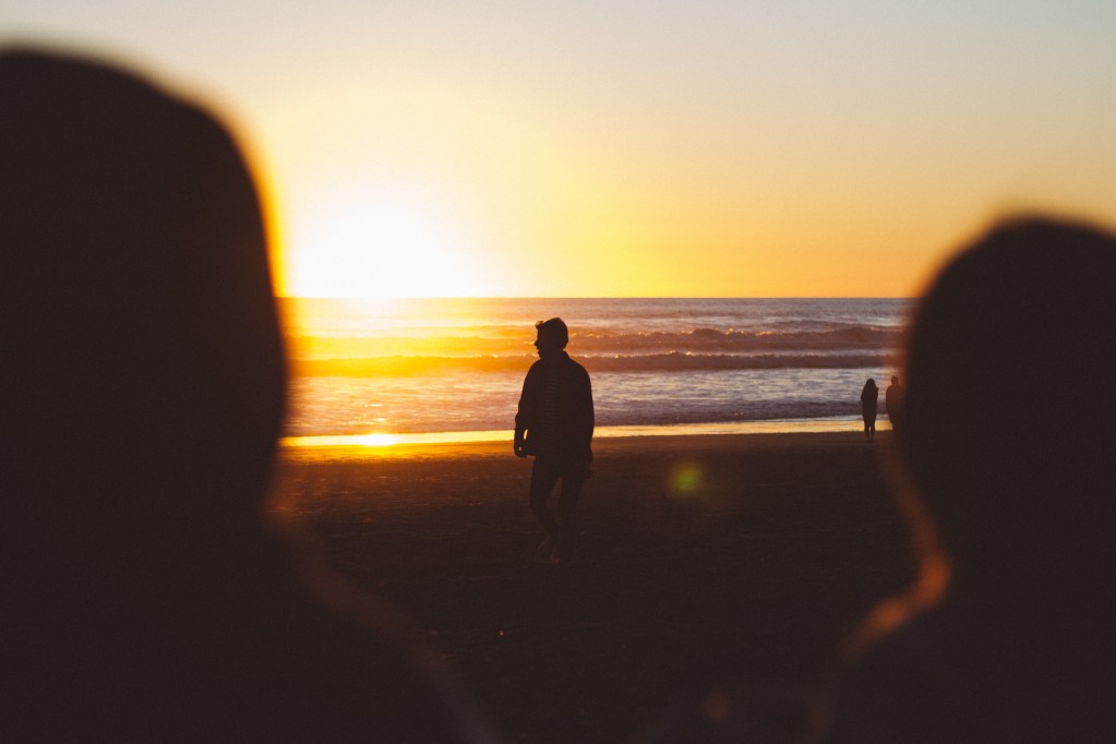 Looking at beach and person