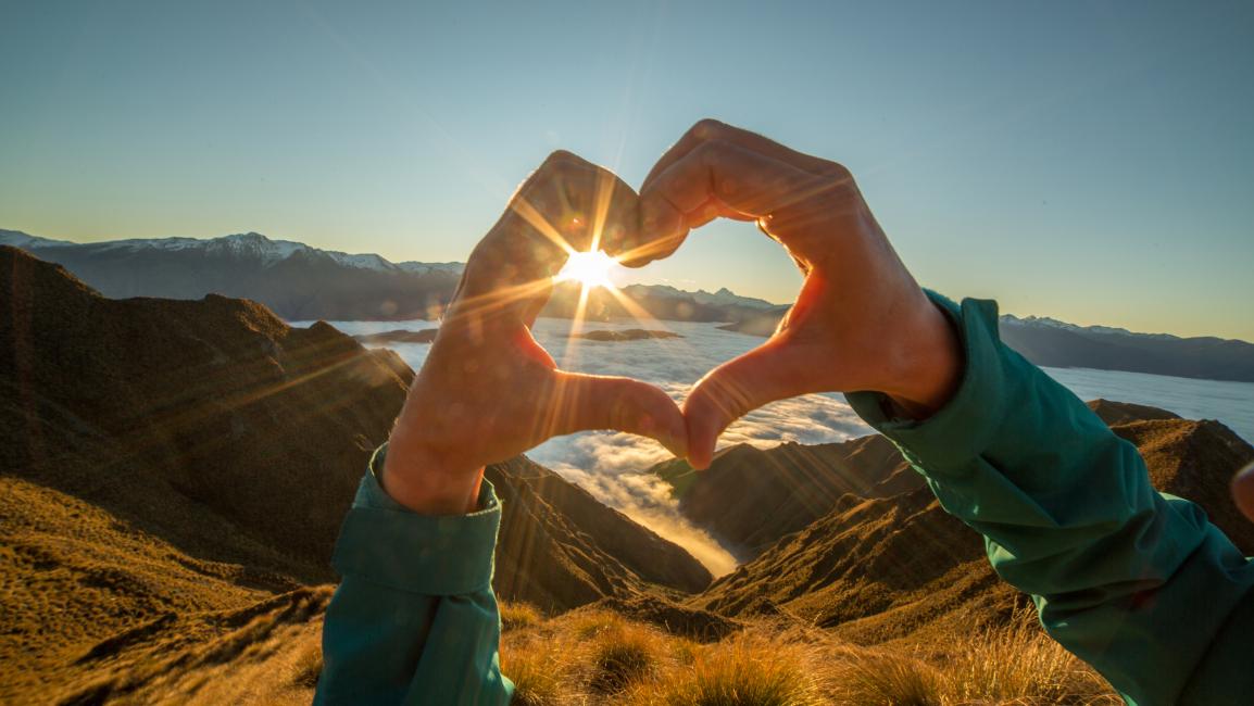 Making heart with hand